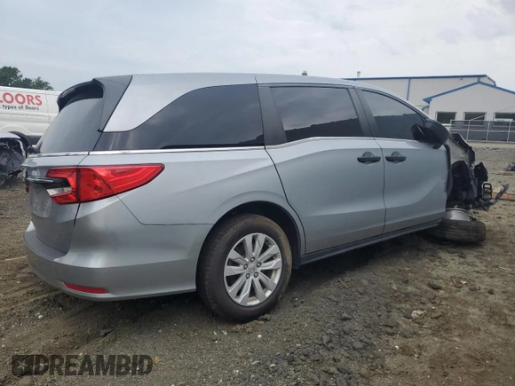 2021 Honda Odyssey LX с VIN 5FNRL6H27MB004951, выставлен на аукционе Copart как лот 65111854 с пробегом Не указан миль и На запчасти • Non repairable. История ставок и продаж доступна на DreamBid. Изображение 3.