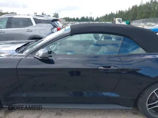 2022 Ford Mustang EcoBoost z VIN 1FATP8UH7N5124631, wystawiony jako IAAI lot #42322481 z przebiegiem 57 502 mil mil oraz . Historia ofert i sprzedaży dostępna na DreamBid. Obrazek 14.