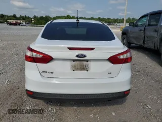 2012 Ford Focus SE z VIN 1FAHP3F2XCL310660, wystawiony jako Copart lot #60217625 z przebiegiem 208 807 mil mil oraz Szkoda całkowita • Salvage title. Historia ofert i sprzedaży dostępna na DreamBid. Obrazek 6.
