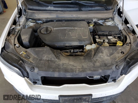 2019 Jeep Cherokee Latitude Plus with VIN 1C4PJMLX3KD127574, listed as a Copart auction lot 55470565 with 106,309 mi miles and Salvage title. Bid and sale history available at DreamBid. Image 12.
