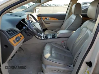 2014 Lincoln MKX z VIN 2LMDJ8JK0EBL14248, wystawiony jako Copart lot #49109075 z przebiegiem 149 317 mil mil oraz Szkoda całkowita • Salvage title. Historia ofert i sprzedaży dostępna na DreamBid. Obrazek 7.
