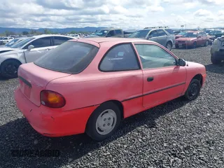 1995 Hyundai Accent z VIN KMHVD14N9SU047038, wystawiony jako IAAI lot #41895712 z przebiegiem 186 094 mil mil oraz . Historia ofert i sprzedaży dostępna na DreamBid. Obrazek 4.