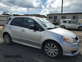 2012 Suzuki SX4 Sportback with VIN JS2YA5A58C6300304, listed as a Copart auction lot 79958624 with 57,585 mi miles and Clean Title. Bid and sale history available at carsss.com. Image 4.