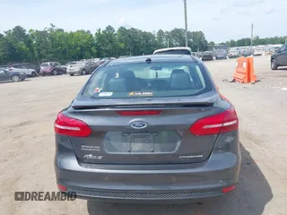 2017 Ford Focus Titanium with VIN 1FADP3J27HL306546, listed as a IAAI auction lot 42480576 with 114,285 mi miles and . Bid and sale history available at DreamBid. Image 17.