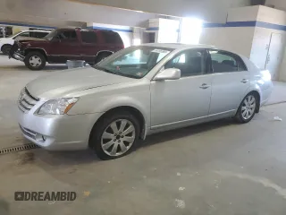 2005 Toyota Avalon XL z VIN 4T1BK36B25U014944, wystawiony jako Copart lot #59155365 z przebiegiem 175 023 mil mil oraz Czysty tytuł • Clean title. Historia ofert i sprzedaży dostępna na DreamBid. Obrazek 1.