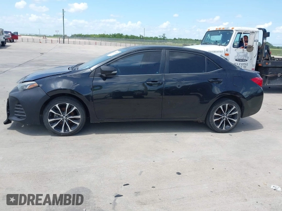 2017 Toyota Corolla L with VIN 5YFBURHE9HP576513, listed as a IAAI auction lot 42460720 with 217,852 mi miles and . Bid and sale history available at DreamBid. Image 14.