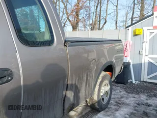 2003 Ford F-150 XL with VIN 2FTRX18W73CB07559, listed as a IAAI auction lot 41452402 with 152,509 mi miles. Bid and sale history available at carsss.com. Image 14.