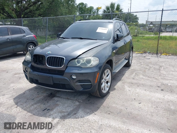2012 BMW X5 35i z VIN 5UXZV4C5XCL990728, wystawiony jako IAAI lot #42386095 z przebiegiem 124 613 mil mil oraz . Historia ofert i sprzedaży dostępna na DreamBid. Obrazek 17.