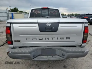 2004 Nissan Frontier XE Desert Runner with VIN 1N6ED26Y44C402138, listed as a Copart auction lot 58828425 with 125,143 mi miles and Salvage title. Bid and sale history available at DreamBid. Image 6.
