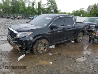 2023 Honda Ridgeline RTL with VIN 5FPYK3F51PB067811, listed as a Copart auction lot 56795995 with 21,500 mi miles and Salvage title. Bid and sale history available at DreamBid. Image 1.