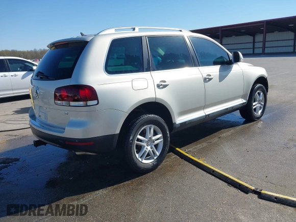 2008 Volkswagen Touareg V6 with VIN WVGBE77L88D003117, listed as a IAAI auction lot 42049007 with 156,940 mi miles and . Bid and sale history available at DreamBid. Image 4.
