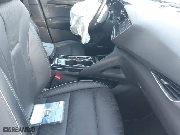 2021 Buick Envision Essence with VIN LRBFZNR47MD132706, listed as a IAAI auction lot 41396556 with 67,297 mi miles. Bid and sale history available at carsss.com. Image 5.