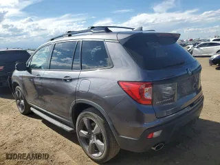 2020 Honda Passport Touring with VIN 5FNYF8H93LB011244, listed as a Copart auction lot 68113584 with 31,232 mi miles and Salvage Title. Bid and sale history available at carsss.com. Image 2.