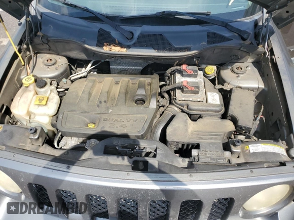 2011 Jeep Patriot Sport with VIN 1J4NT1GB6BD287389, listed as a Copart auction lot 56495085 with 188,650 mi miles and Salvage title. Bid and sale history available at DreamBid. Image 12.