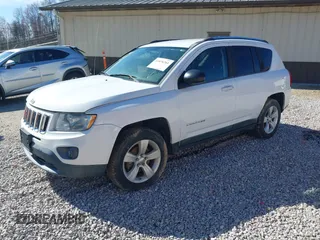 2011 Jeep Compass with VIN 1J4NF1FB7BD197404, listed as a IAAI auction lot 41876261 with 150,891 mi miles and . Bid and sale history available at DreamBid. Image 2.