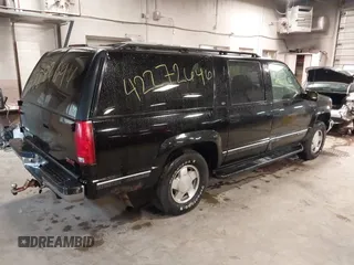 1999 GMC Suburban z VIN 3GKFK16R3XG529761, wystawiony jako IAAI lot #42272646 z przebiegiem 269 114 mil mil oraz . Historia ofert i sprzedaży dostępna na DreamBid. Obrazek 4.
