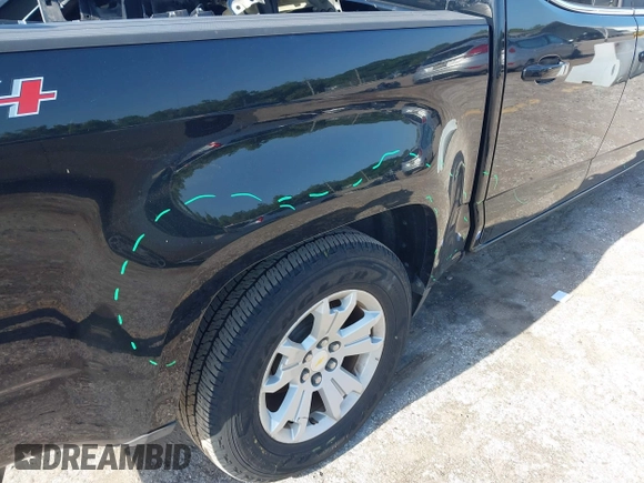2018 Chevrolet Colorado 4WD LT z VIN 1GCGTCEN0J1265248, wystawiony jako IAAI lot #42247568 z przebiegiem 74 863 mil mil oraz . Historia ofert i sprzedaży dostępna na DreamBid. Obrazek 21.