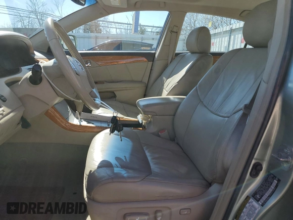 2005 Toyota Avalon XL with VIN 4T1BK36B15U037227, listed as a Copart auction lot 50135005 with 136,489 mi miles and Salvage Title. Bid and sale history available at DreamBid. Image 7.