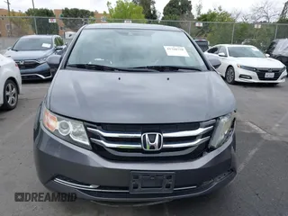 2014 Honda Odyssey EX-L with VIN 5FNRL5H64EB055807, listed as a IAAI auction lot 41760758 with 144,346 mi miles and . Bid and sale history available at carsss.com. Image 12.