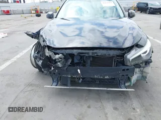 2014 Infiniti Q50 Premium z VIN JN1BV7AP3EM690571, wystawiony jako IAAI lot #42136354 z przebiegiem 191 969 mil mil oraz . Historia ofert i sprzedaży dostępna na DreamBid. Obrazek 6.