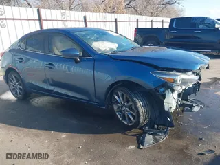 2018 Mazda Mazda3 4-Door Grand Touring with VIN 3MZBN1W38JM179689, listed as a IAAI auction lot 41305303 with 77,277 mi miles. Bid and sale history available at carsss.com. Image 1.