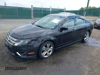 2011 Ford Fusion SPORT with VIN 3FAHP0KC6BR171723, listed as a IAAI auction lot 42072610 with 173,213 mi miles. Bid and sale history available at carsss.com. Image 2.