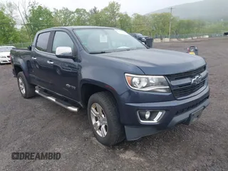2018 Chevrolet Colorado 4WD Z71 z VIN 1GCGTDEN9J1196064, wystawiony jako IAAI lot #42183181 z przebiegiem 154 791 mil mil oraz . Historia ofert i sprzedaży dostępna na DreamBid. Obrazek 1.