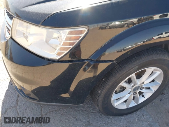 2015 Dodge Journey SXT with VIN 3C4PDCBG3FT678686, listed as a IAAI auction lot 42101541 with 185,514 mi miles and . Bid and sale history available at DreamBid. Image 6.