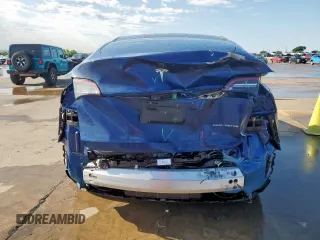 2022 Tesla Model Y Long Range z VIN 7SAYGDEEXNF372693, wystawiony jako Copart lot #53275555 z przebiegiem 51 165 mil mil oraz Szkody całkowita. Historia ofert i sprzedaży dostępna na DreamBid. Obrazek 6.