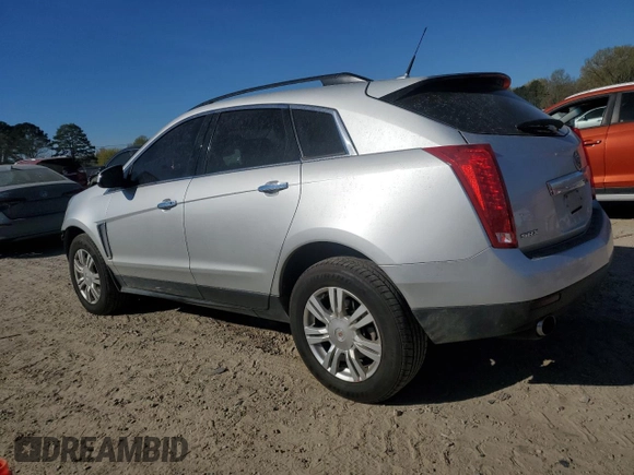 2014 Cadillac SRX with VIN 3GYFNAE36ES680324, listed as a Copart auction lot 50034625 with 150,014 mi miles and Salvage Title. Bid and sale history available at DreamBid. Image 2.
