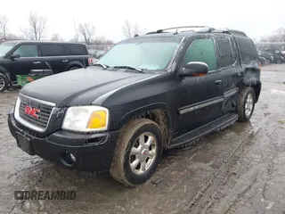 2005 GMC Envoy XL SLE with VIN 1GKET16S156160473, listed as a IAAI auction lot 41510661 with 233,942 mi miles. Bid and sale history available at carsss.com. Image 17.
