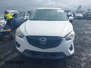 2015 Mazda CX-5 Grand Touring with VIN JM3KE4DY0F0483037, listed as a IAAI auction lot 41578222 with 102,988 mi miles. Bid and sale history available at carsss.com. Image 12.