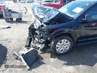 2017 Dodge Journey SE z VIN 3C4PDCAB2HT698940, wystawiony jako IAAI lot #41843176 z przebiegiem 141 499 mil mil oraz . Historia ofert i sprzedaży dostępna na DreamBid. Obrazek 17.