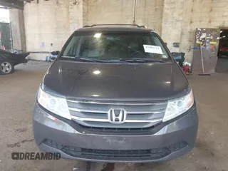 2012 Honda Odyssey EX-L with VIN 5FNRL5H67CB016934, listed as a IAAI auction lot 42405714 with 248,512 mi miles and . Bid and sale history available at DreamBid. Image 12.