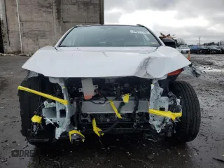 2024 Toyota bZ4X XLE with VIN JTMABACA4RA079253, listed as a Copart auction lot 44017135 with 2,445 mi miles and Salvage Title. Bid and sale history available at DreamBid. Image 5.