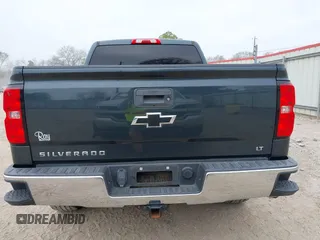 2018 Chevrolet Silverado 1500 LT with VIN 3GCPCREC1JG497019, listed as a IAAI auction lot 41459936 with 52,691 mi miles and . Bid and sale history available at DreamBid. Image 16.