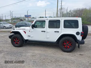 2021 Jeep Wrangler Unlimited Rubicon z VIN 1C4HJXFG1MW577829, wystawiony jako IAAI lot #41997002 z przebiegiem 26 443 mil mil oraz . Historia ofert i sprzedaży dostępna na DreamBid. Obrazek 15.