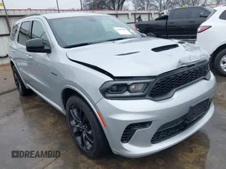 2023 Dodge Durango R/T Plus z VIN 1C4SDJCT3PC677402, wystawiony jako IAAI lot #41447960 z przebiegiem 24 812 mil mil oraz . Historia ofert i sprzedaży dostępna na DreamBid. Obrazek 1.