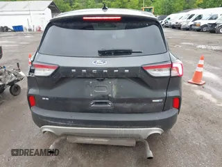 2020 Ford Escape SE with VIN 1FMCU9G64LUA25167, listed as a IAAI auction lot 42307557 with 82,524 mi miles and . Bid and sale history available at DreamBid. Image 17.