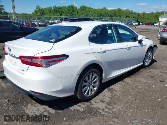 2019 Toyota Camry LE with VIN 4T1B11HK2KU187475, listed as a IAAI auction lot 42192293 with 44,413 mi miles and . Bid and sale history available at DreamBid. Image 4.