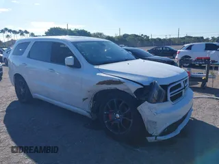 2015 Dodge Durango R/T with VIN 1C4SDHCTXFC938001, listed as a IAAI auction lot 41662269 with 201,918 mi miles and . Bid and sale history available at DreamBid. Image 1.
