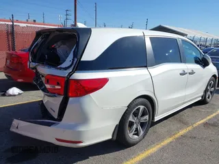 2018 Honda Odyssey Touring with VIN 5FNRL6H8XJB019122, listed as a IAAI auction lot 41820212 with 144,014 mi miles. Bid and sale history available at carsss.com. Image 20.