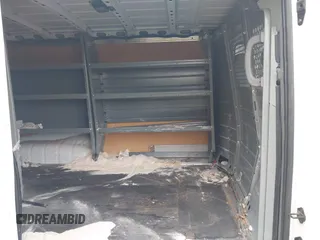 2021 Nissan NV Cargo SV z VIN 1N6BF0KYXMN805682, wystawiony jako IAAI lot #42152216 z przebiegiem 82 671 mil mil oraz . Historia ofert i sprzedaży dostępna na DreamBid. Obrazek 8.