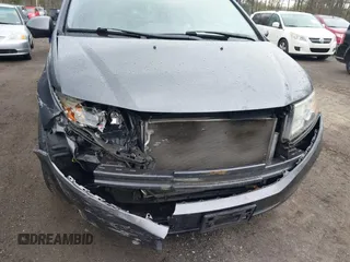 2014 Honda Odyssey EX-L with VIN 5FNRL5H63EB033684, listed as a IAAI auction lot 42025249 with 128,017 mi miles and . Bid and sale history available at carsss.com. Image 6.