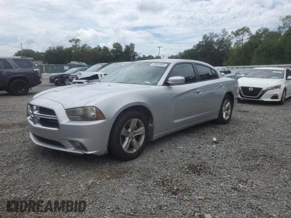 2012 Dodge Charger SE with VIN 2C3CDXBG4CH203207, listed as a Copart auction lot 69533004 with 156,015 mi miles and Salvage Title. Bid and sale history available at DreamBid. Image 1.