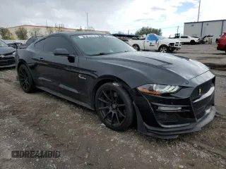 2018 Ford Mustang GT with VIN 1FA6P8CF6J5181359, listed as a Copart auction lot 56077125 with 79,573 mi miles and Salvage title. Bid and sale history available at DreamBid. Image 4.