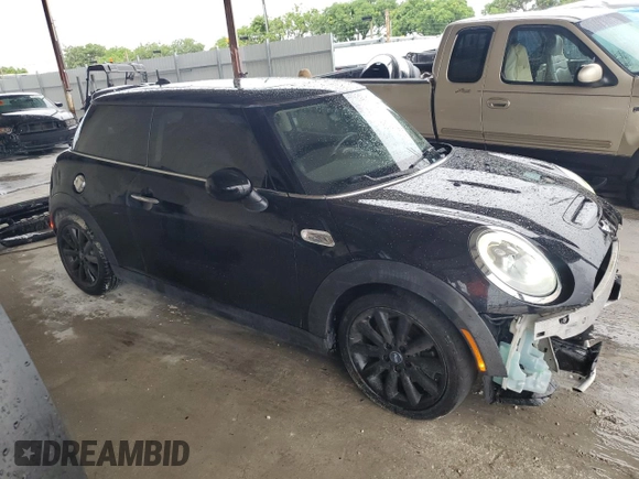 2017 MINI Hardtop Cooper S with VIN WMWXP7C51H2A45300, listed as a Copart auction lot 59216405 with 70,506 mi miles and Salvage title. Bid and sale history available at DreamBid. Image 4.