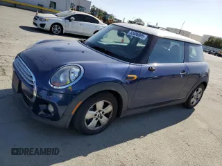 2014 MINI Hardtop with VIN WMWXM5C52ET932677, listed as a Copart auction lot 53486865 with 189,039 mi miles and Salvage title. Bid and sale history available at DreamBid. Image 1.
