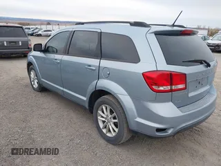 2013 Dodge Journey SXT with VIN 3C4PDDBG2DT724768, listed as a IAAI auction lot 40926457 with 150,862 mi miles and . Bid and sale history available at DreamBid. Image 3.