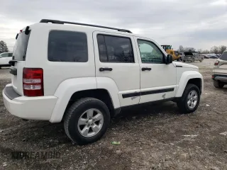 2010 Jeep Liberty Sport with VIN 1J4PP2GK9AW133958, listed as a Copart auction lot 47265675 with 124,466 mi miles and Salvage Title. Bid and sale history available at DreamBid. Image 3.